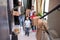 Family in the hall of their home with their dog