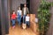 Family in the hall of their new apartment