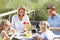 Family having breakfast outdoors on vacation