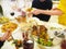 Family having dinner together sitting at the wooden table