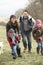 Family having fun in the country in winter