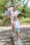 Family having fun walking on tree trunk in camp