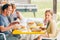 Family having lunch outside on a terrace