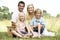 Family having picnic in countryside