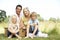 Family having picnic in countryside