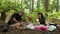 Family having a picnic outdoors