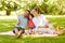 Family having picnic and taking selfie at park