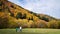 A family having a relaxing walk in arrowtown of New Zealand