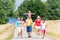 Family having walk on path in summer