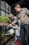 Family Helping Teaching Kid Gardening