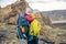 Family hike, mother with baby in backpack