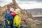 Family hike, mother with baby in backpack