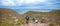 Family hiking and travelers enjoying beautiful panorama