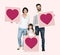 Family holding heart board icons