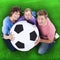 Family holds soccer ball