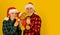 Family holiday. We love christmas. Loving couple yellow background. Christmas time. Couple in love with teddy bear soft