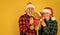 Family holiday. We love christmas. Loving couple yellow background. Christmas time. Couple in love with teddy bear soft