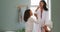 Family home, bathroom and brushing teeth with mother and daughter learning good hygiene and dental habits for health and