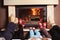 Family at home. Feet in socks near fireplace. Winter holiday concept