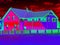 Family house in infrared thermovision scan. Building warmth scale