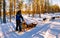 Family husky sledge in Lapland Finland reflex