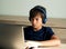 Family issue, Teen boy wearing headset have bad habit problem addicted to online game on Computer. Teenage boy playing online game