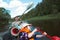 Family kayak trip. Father and daughter rowing boat on the river, a water hike, a summer adventure. Eco-friendly and extreme