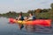 Family in a kayak on a water walk