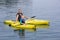 Family Kayaking together on a beautiful lake