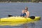 Family Kayaking together on a beautiful lake