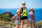 Family with kids tourists standing above Preveli beach, Crete, Greece