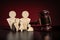 Family law civilian concept - wooden people family figures and wooden gavel on table