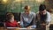 Family learning homework at home. Cute little boy studying with parents.