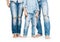 Family legs in tattered jeans