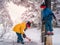 Family with little boy and girl is having fun playing in Zao winter skii resort, Sendai, Japan