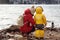 Family with little son enjoy view of lake Alpsee, Bavaria, Germany