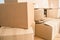 Family loses their home and moves, fills the cardboard boxes for the move due to the crisis