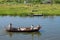 A family makes a boat trip on canals of Enkhuizen