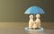 Family model and umbrella, Family insurance concept, childrens healthcare
