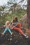 Family mother and daughter child relaxing in forest travel camping picnic outdoor