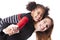 A family mother with girl child posing on a white background studio