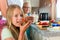 Family - mother making breakfast for school