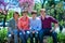 Family mother, sons and grandmother in the park