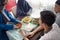 Family muslim eating in dinner table together