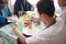 Family muslim eating in dinner table together