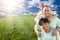 Family Over Clouds, Sky and Grass Field