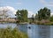 Family Paddle Boarding And Canoeing In River