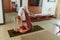 Family. Parent And Kid Exercising Together At Home. Young Woman And Child Doing Partner Yoga. Sporty Daughter And Mother