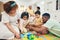 Family, parents and children on floor with toys for playing, creative activity and bonding at home. Education, happy and