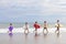 Family Parents Girl Children Surfboards on Beach